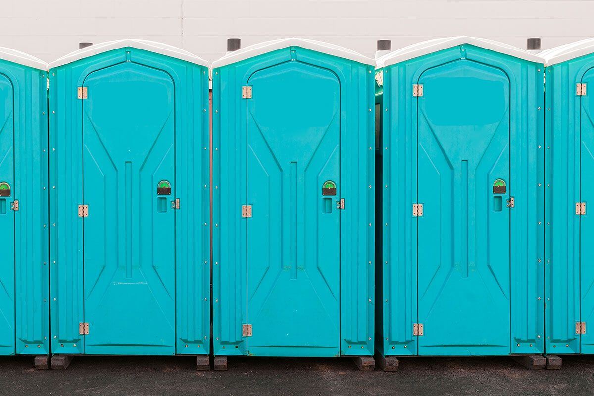Industrial portable restroom units at a plant in Rapid City, South Dakota